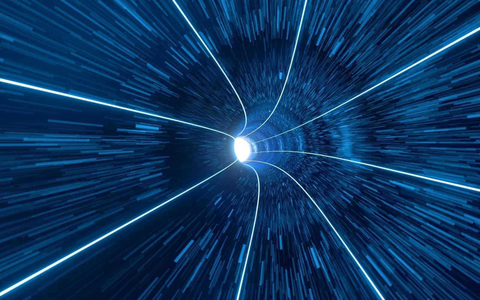 Teleportation Through Wormholes