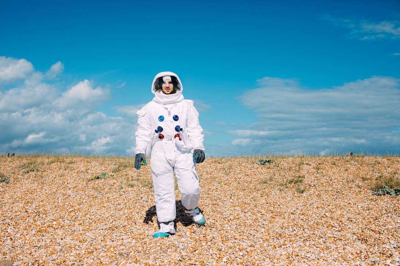 A Futuristic Pressure Suit While Jumping Through The Centre of The Earth